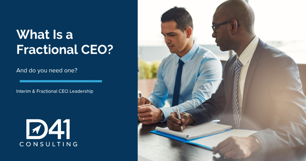 Two business executives working through a problem together at a conference table, beside the title What Is a Fractional CEO?
